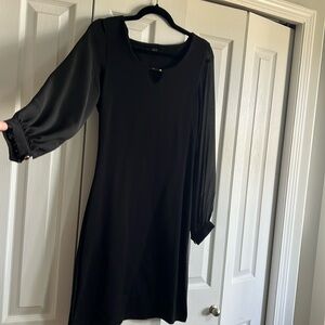 Salian black dress, the arms are sheer. perfect condition.